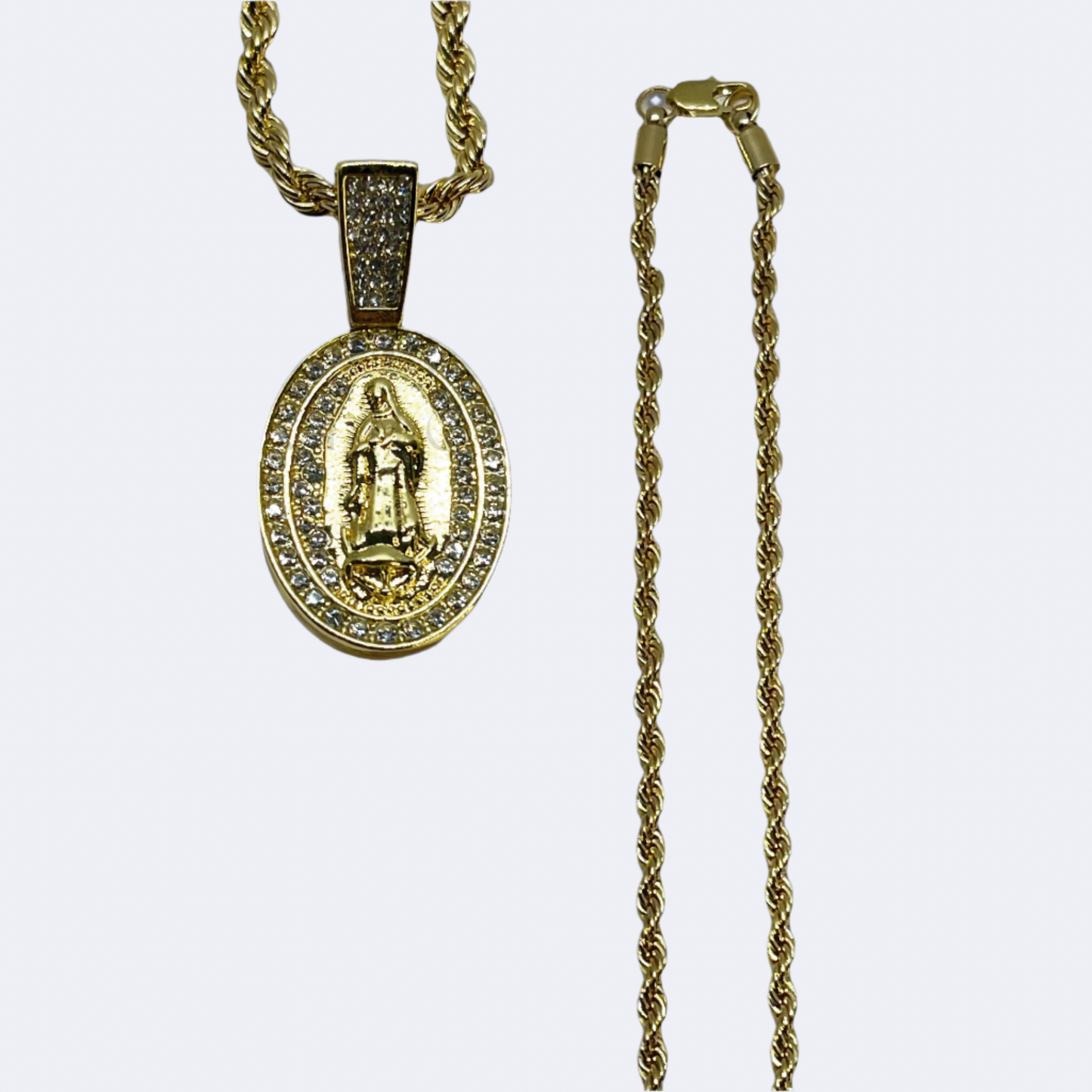Guadalupe Rope Gold Stainless Steel Necklace with an oval pendant displaying Our Lady of Guadalupe, accented by radiant rhinestones, shown in a detailed close-up