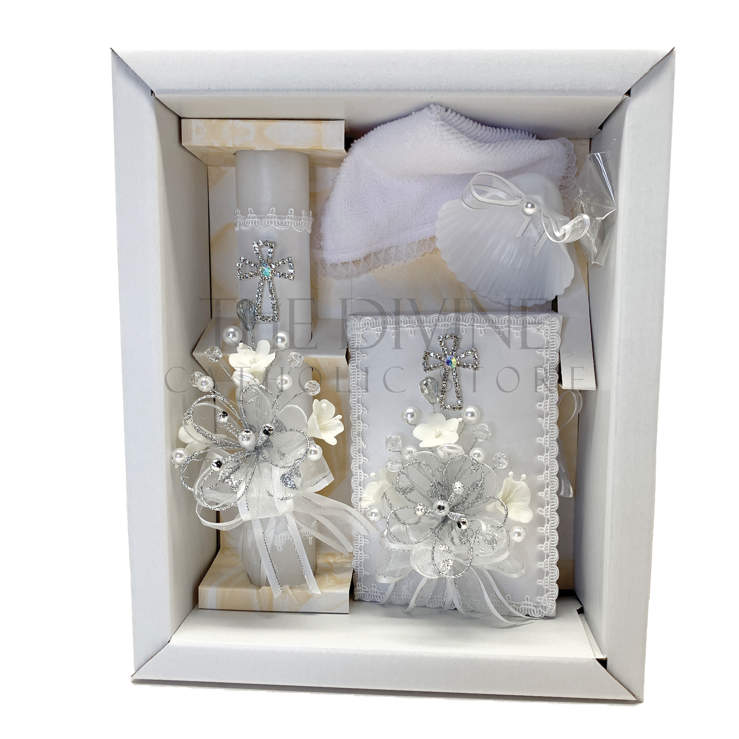 The image features a beautifully designed 5-piece baptism candle set, including a candle, a towel, rosary, bible, and a shell. The candle is adorned with white fabric, a braided nylon rope, small white flowers, and rhinestone embellishments, giving it an elegant and sacred look.