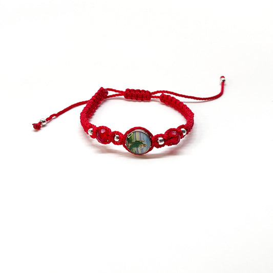 Front view of a handcrafted red nylon St. Jude bracelet featuring silver accents and sparkling red rhinestones on a white background.