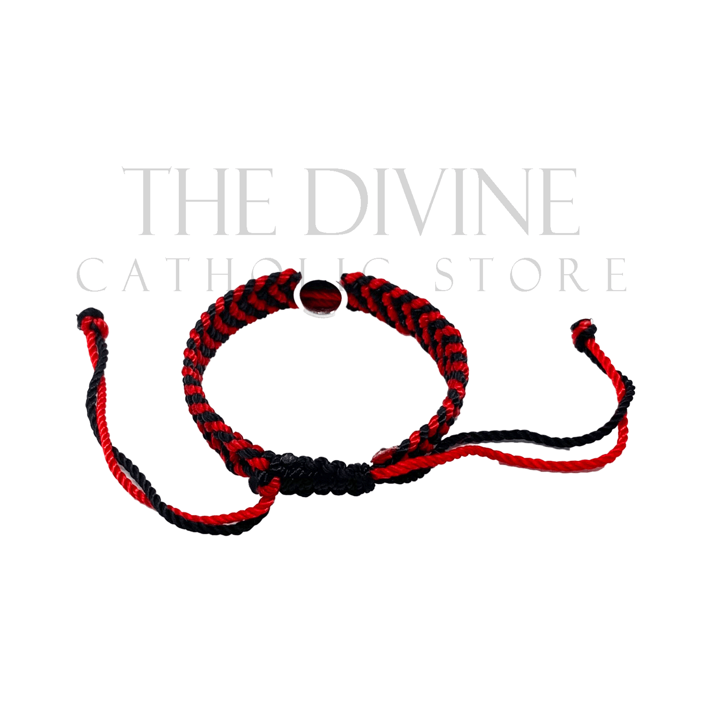 Back view of this handmade red and black woven St. Benedict bracelet with adjustable nylon cord and silver medal charm on a white background.