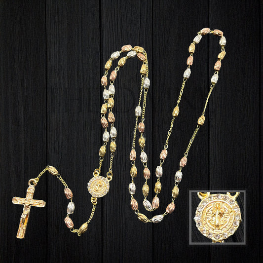 Tri-color stainless steel rosary with rhinestone St. Benedict centerpiece pendant and crucifix on a black background.