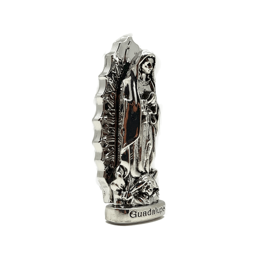 This silver dashboard Our Lady of Guadalupe figurine is great for small spaces or for vehicle, side view.
