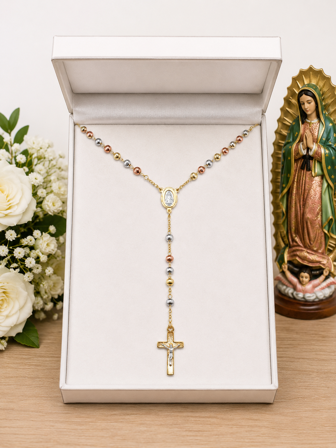 18k tri-color gold plated rosary in gift box with Our Lady of Guadalupe statue and white roses