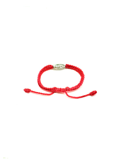 Back view of adjustable red braided baby bracelet with silver Our Lady of Guadalupe charm and silver beads, fits infants 0–12 months on a white background