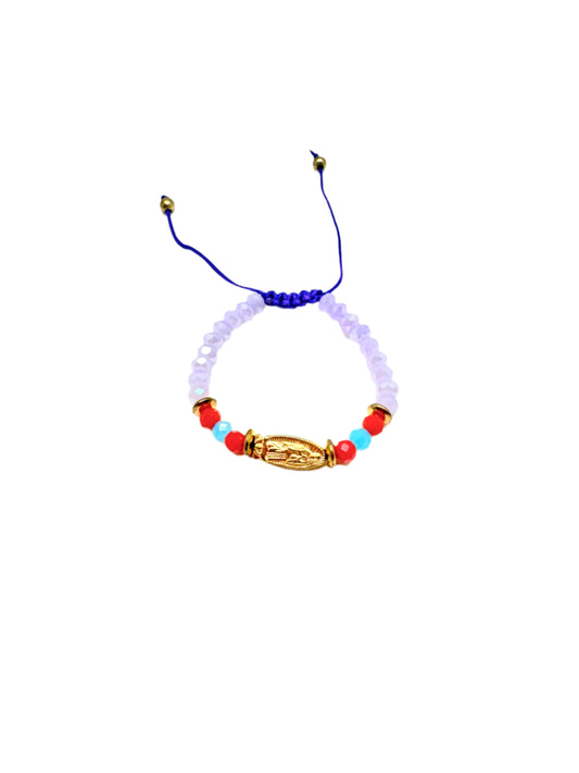 Purple beaded gold colored Guadalupe charm baby, accented with red and blue beads bracelet on a white background. 