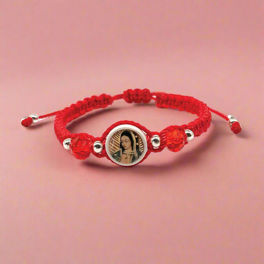 This Guadalupe Charm bracelet is red with woven nylon, with silver and crystal beads on red background,. 