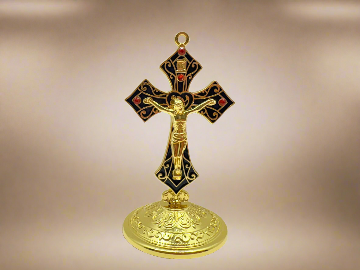 Gold Saint Benedict dashboard crucifix with red rhinestones and adhesive base, 3.5-inch Catholic car cross on a gold background. 