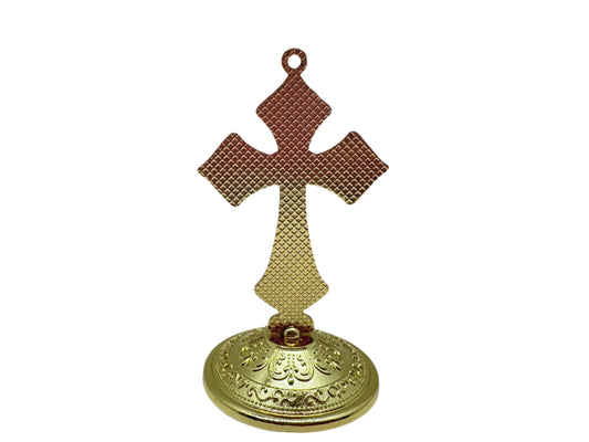 Back view of decorative saint Benedict crucifix with gold and navy design and red rhinestone accents, back is gold color only on a white background