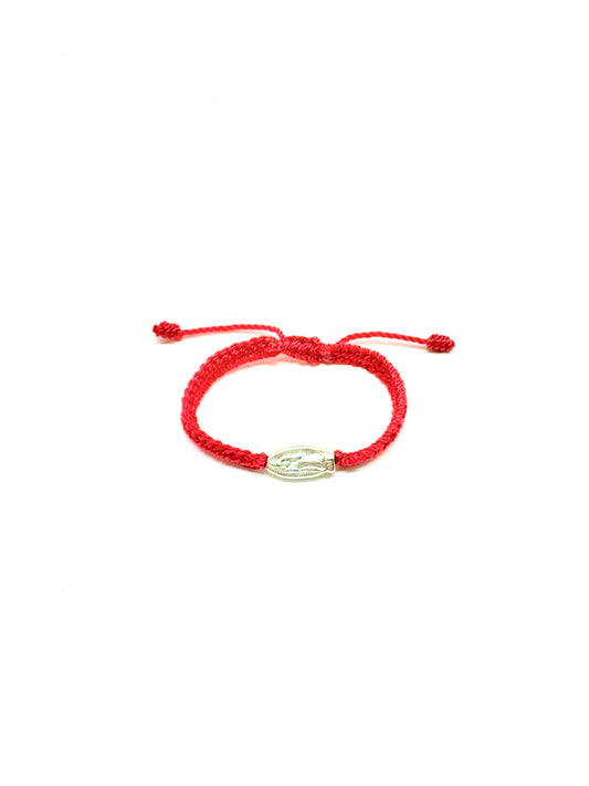 Front view of adjustable red braided baby bracelet with silver Our Lady of Guadalupe charm and silver beads, fits infants 0–12 months on a white background