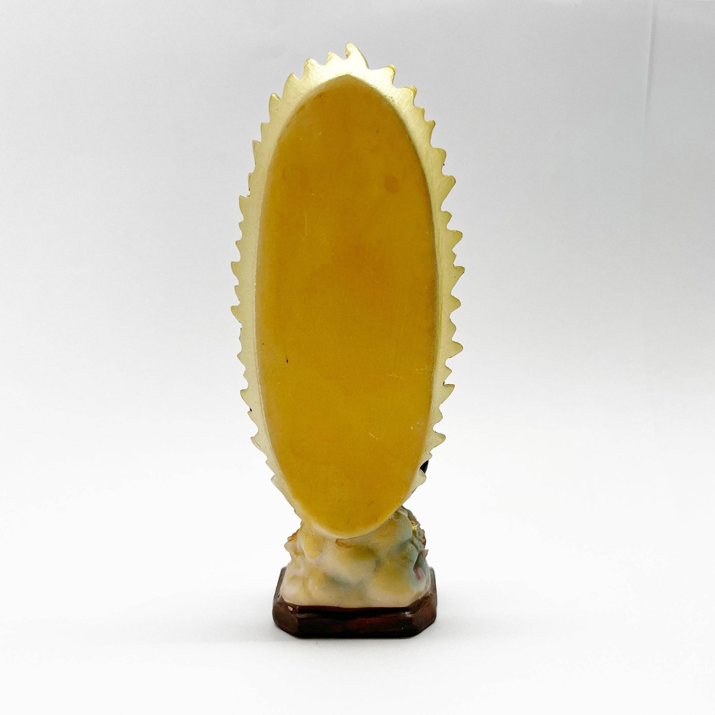 Back view of 5 inch Our Lady of Guadalupe Catholic statue showing golden halo detail
