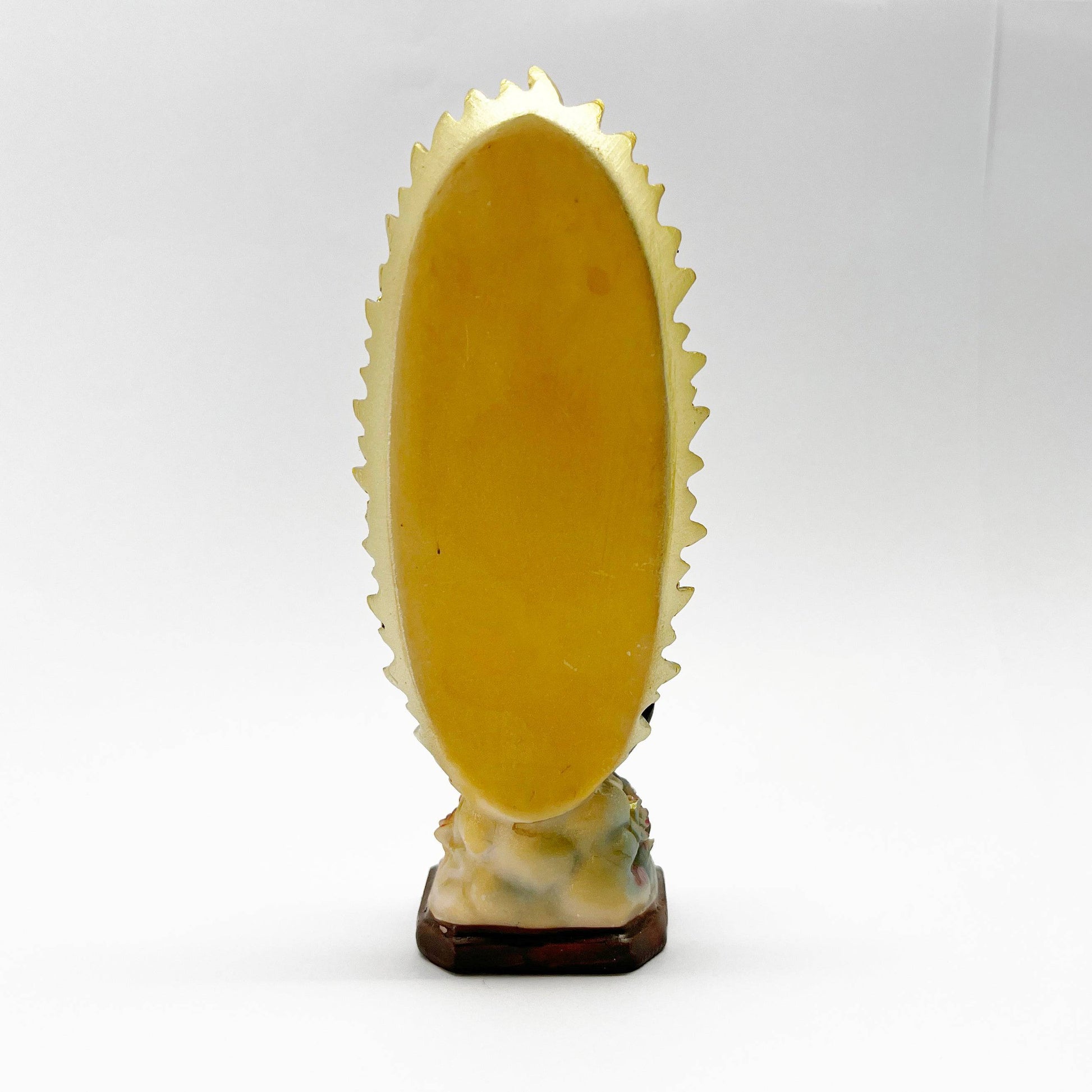 Back view of 5 inch Our Lady of Guadalupe Catholic statue showing golden halo detail