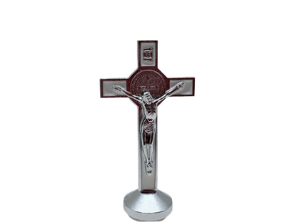 Front view of white dashboard Saint Benedict crucifix with silver corpus christi and St. Benedict medal  on a white background