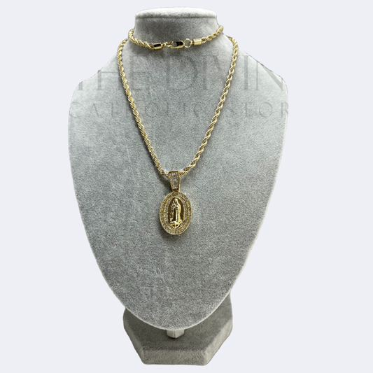Guadalupe Rope Gold Stainless Steel Necklace featuring an oval pendant with a detailed image of Our Lady of Guadalupe, bordered by sparkling rhinestones, displayed on a sturdy rope chain.