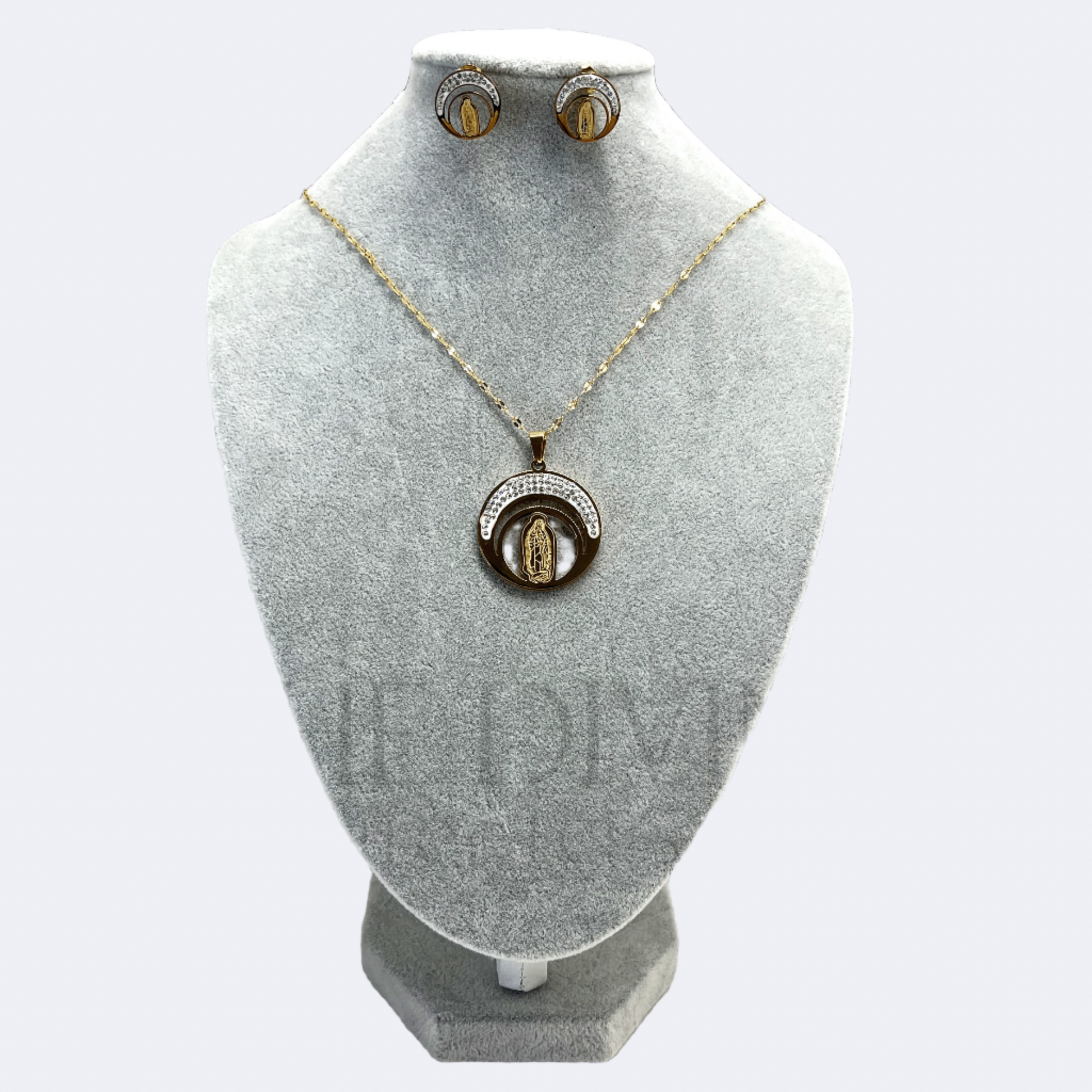 Our Lady of Guadalupe Moon Necklace and Earring Set in stainless steel, showcasing the intricate design of the Virgin of Guadalupe pendant set against a crescent moon, with matching earrings.