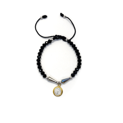 Front view of a adjustable black St. Benedict bracelet featuring durable nylon thread, silver accents, and rhinestone beads on a white background. 