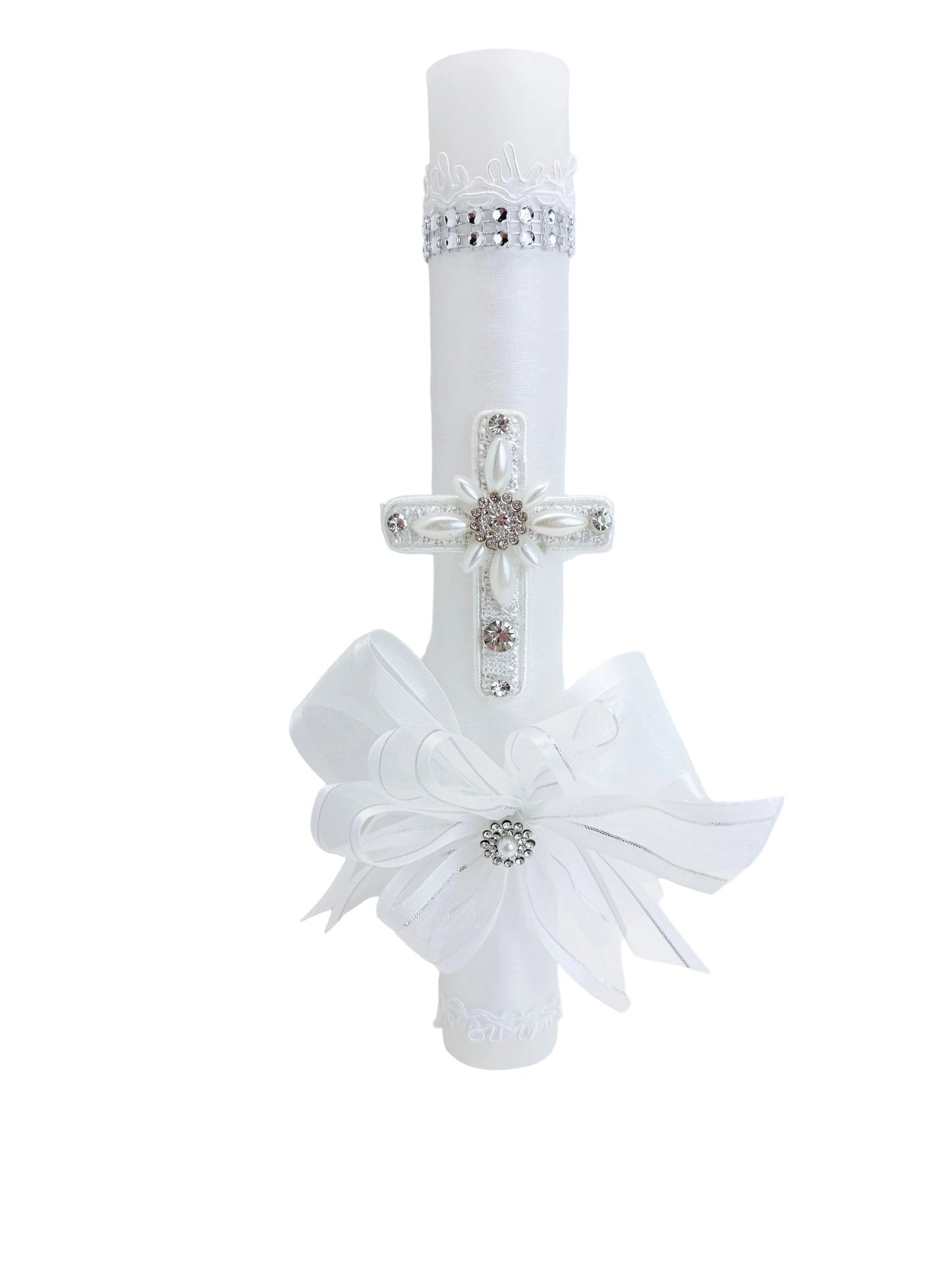Front view of white baptism candle with rhinestone band pearl cross and white organza bow