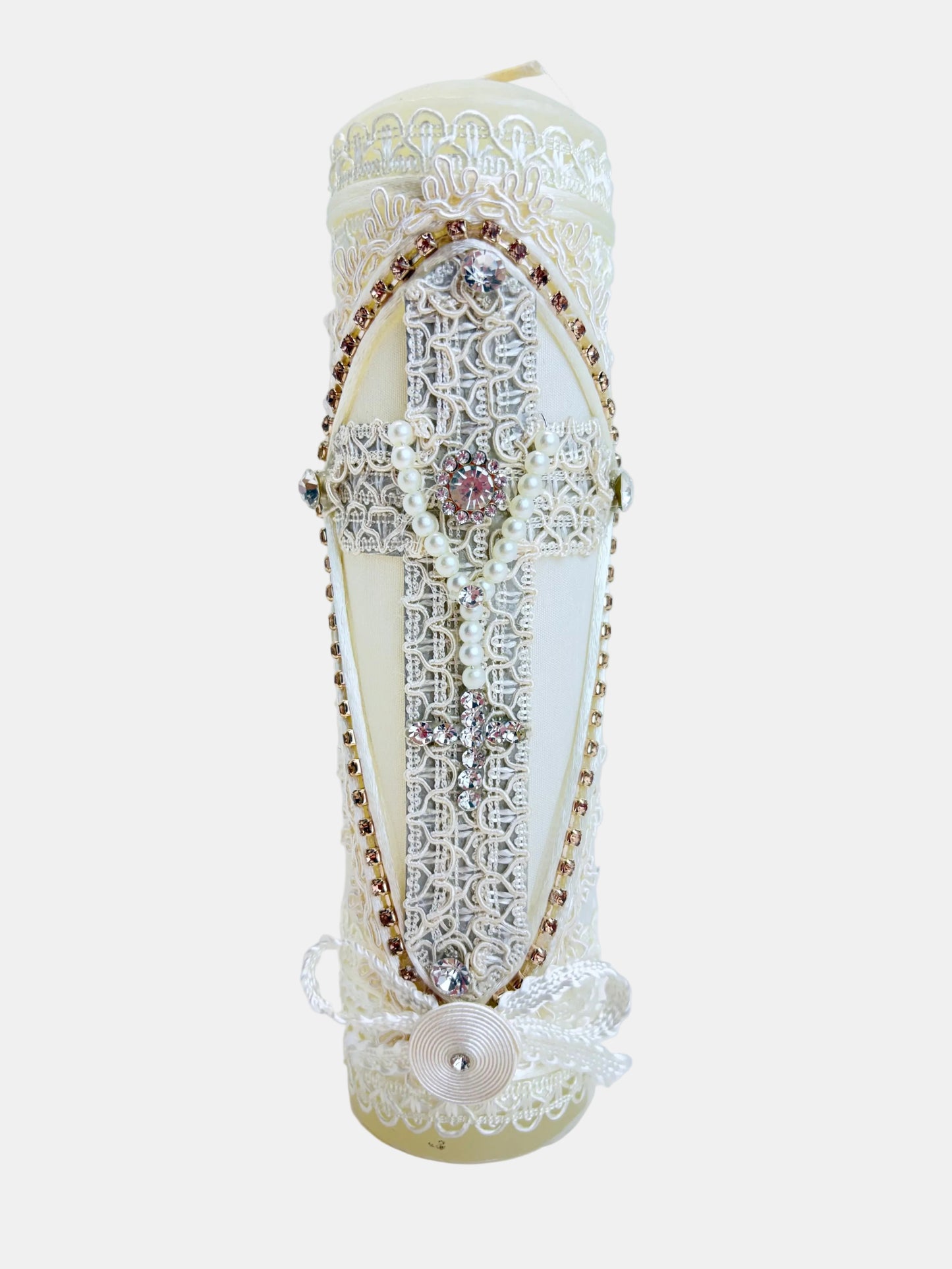 Front view of ivory baptism pillar candle with lace cross pearl rosary gold rhinestone trim 7 inch