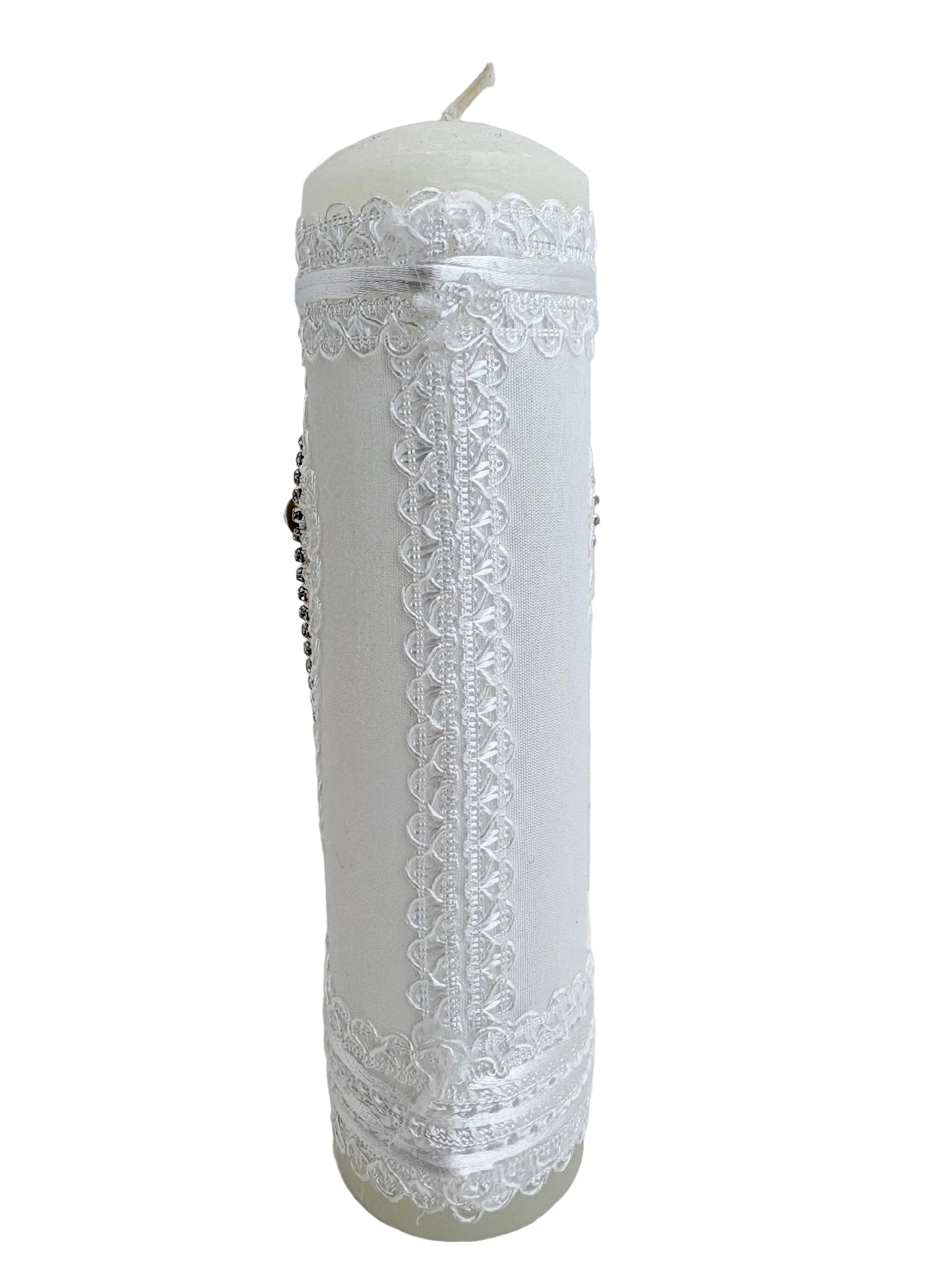 Back view of white baptism candle showing full lace wrap with silver ribbon trim and rhinestone details