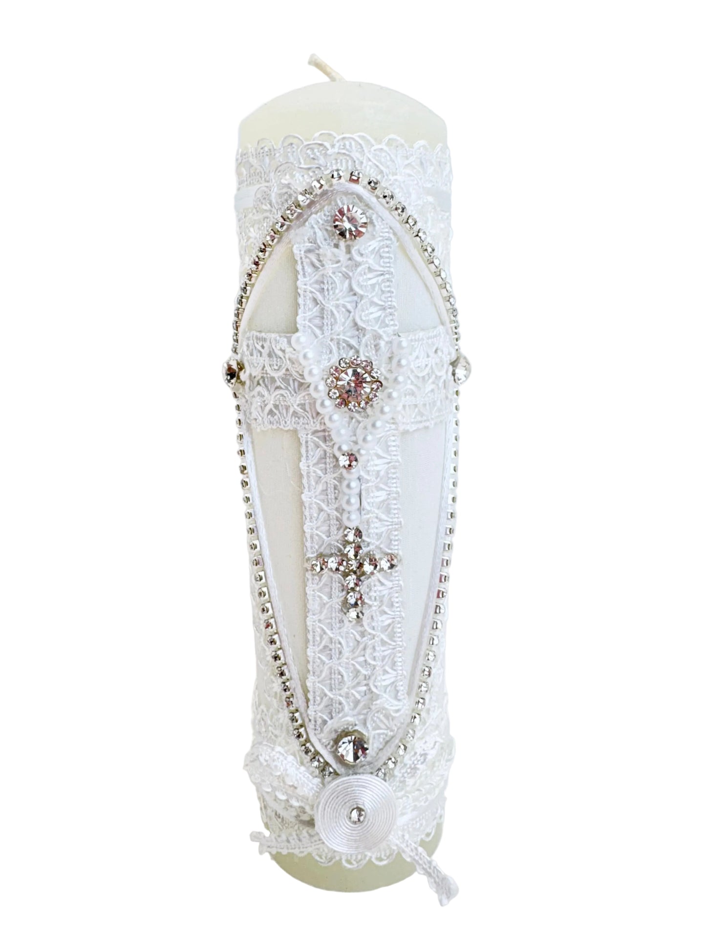 Front view of white baptism pillar candle with lace cross pearl rosary and rhinestone trim 7 inch
