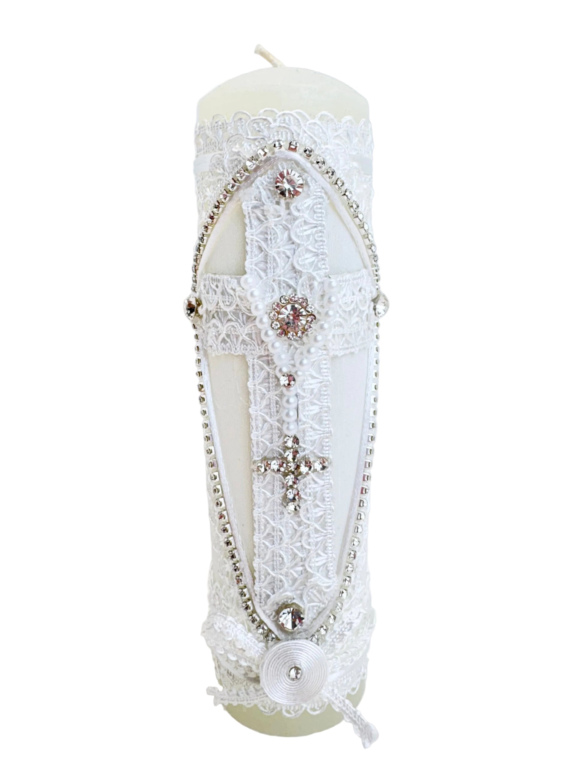Front view of white baptism pillar candle with lace cross pearl rosary and rhinestone trim 7 inch