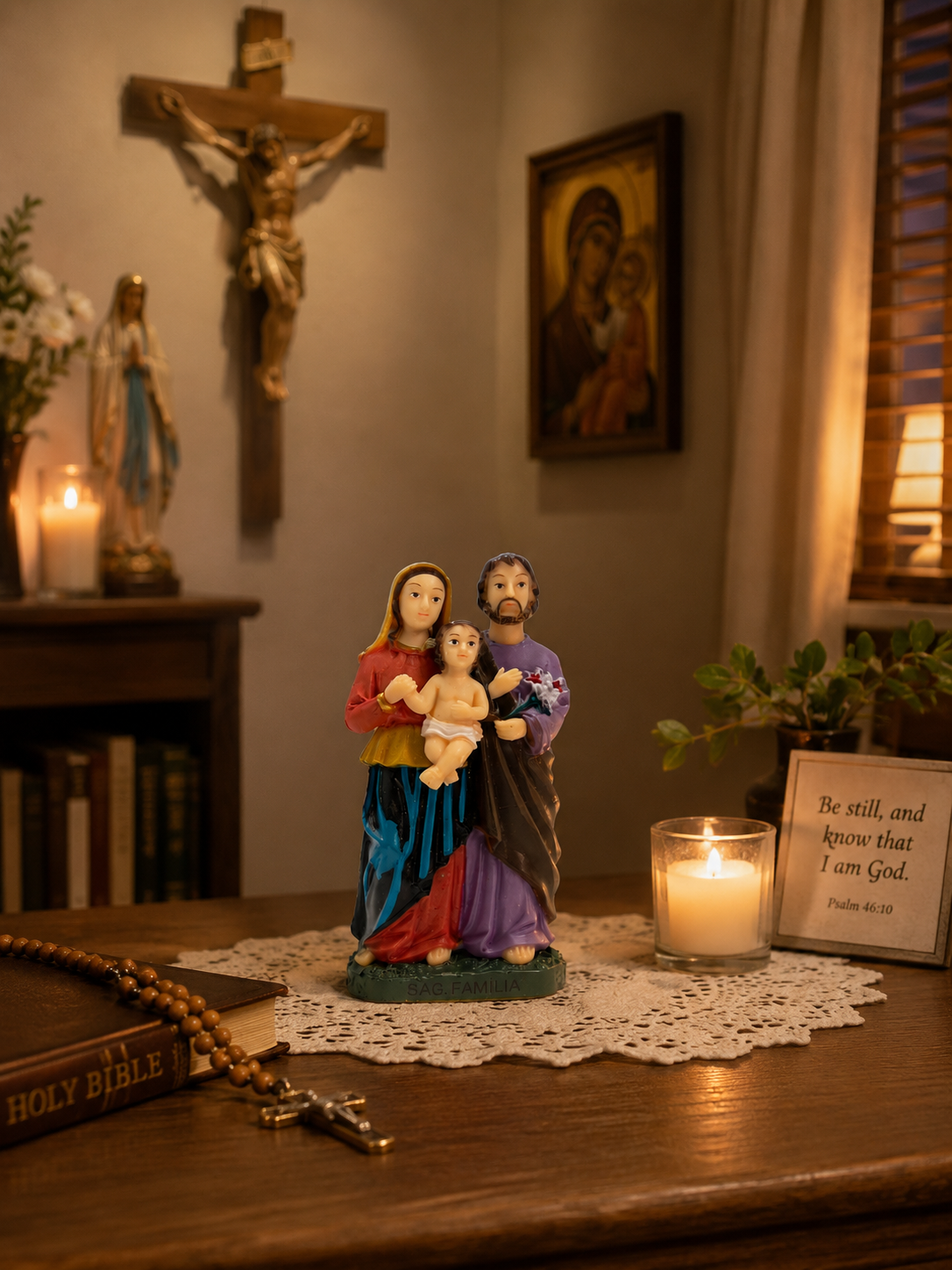 3 inch Holy Family statue displayed on Catholic home altar with candle rosary and religious decor