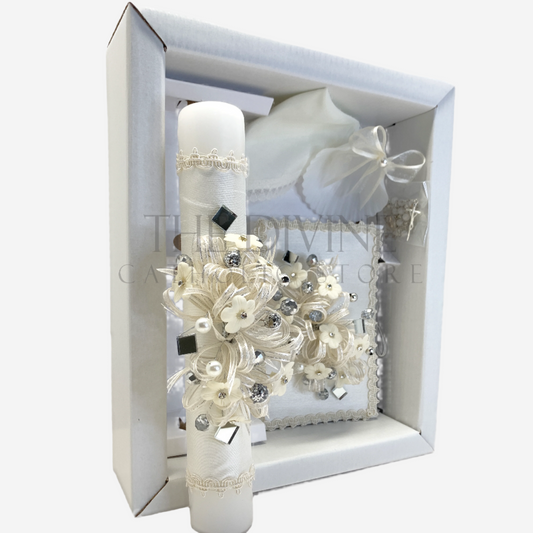 Close up of ivory baptism candle with floral accents from 5 piece Catholic christening set style 56
