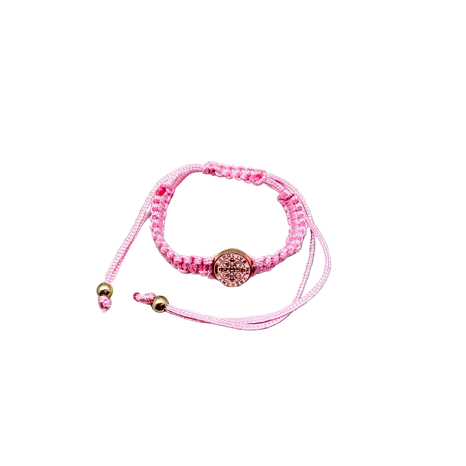 Pink St Benedict baby bracelet adjustable Catholic infant jewelry front view on white background