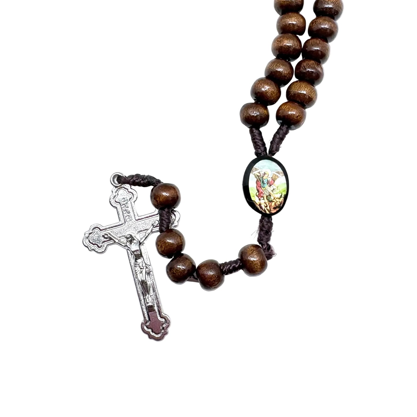Close up of St Michael rosary beads and religious medal
