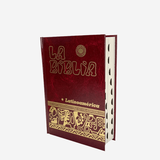 La Biblia Latinoamericana pocket-sized Bible with a red cover and indexed tabs for easy navigation.