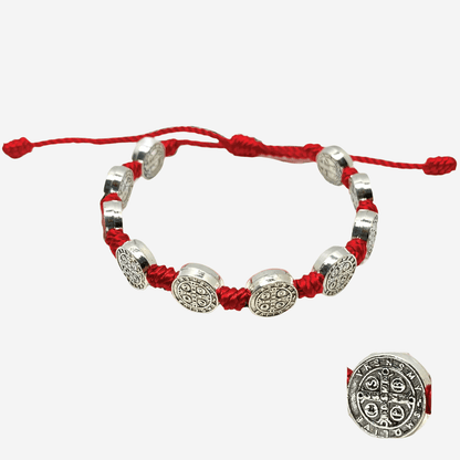 Front view of a St. Benedict 10 Medal red cord bracelet with oxidized silver accents, adjustable size on a white background. 
