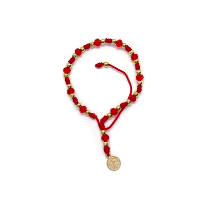 Handcrafted red St. Benedict beaded bracelet with faceted red beads, gold-tone accents, and an adjustable knot, featuring a St. Benedict medal charm.