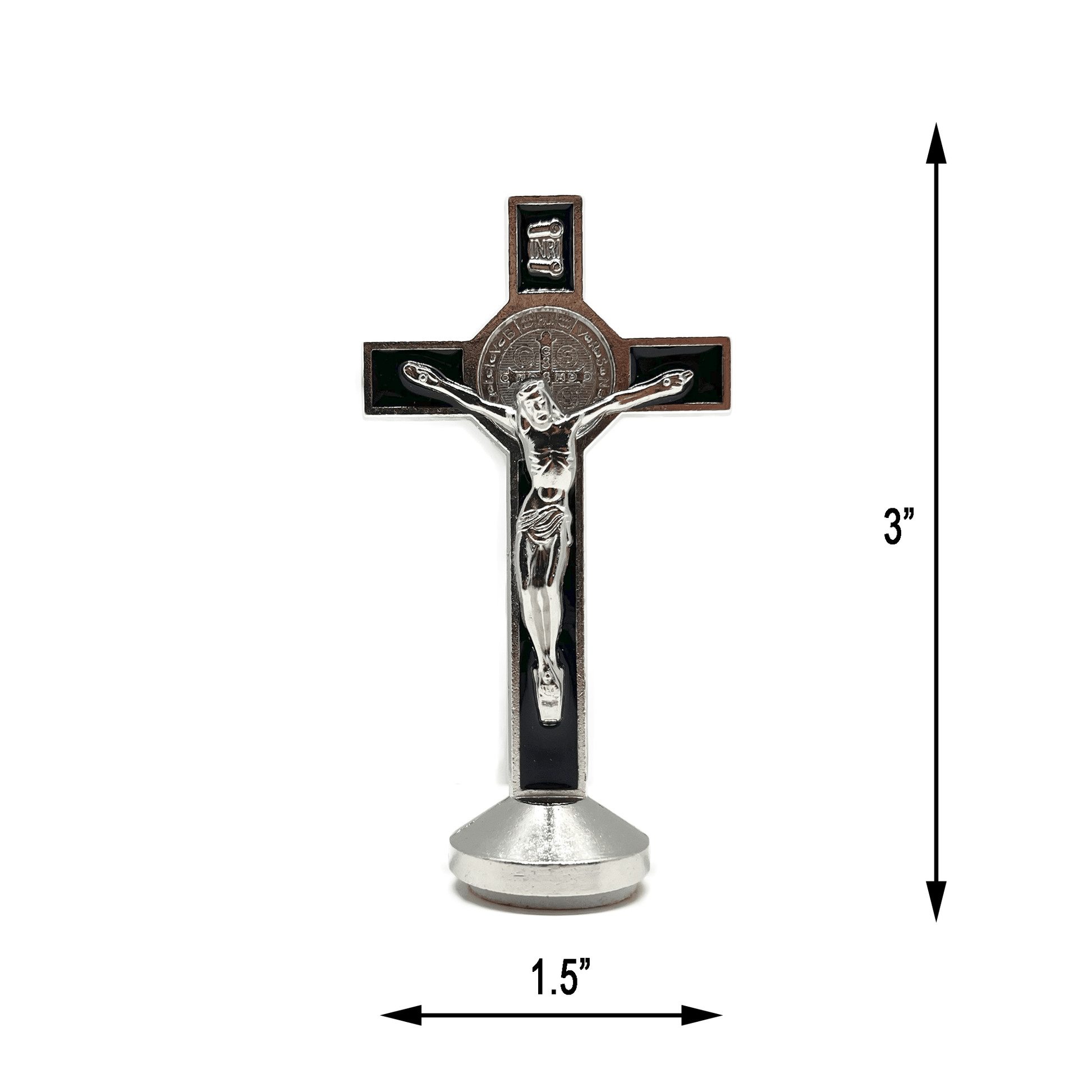 This 3 inch dashboard St. Benedict crucifix is black with a silver St.Benedict medal behind a silver corpus, silver-tone detailing and sturdy base with adhesive at bottom, showing detailed measurements, 3 Inch tall, 1.5 inches wide. 