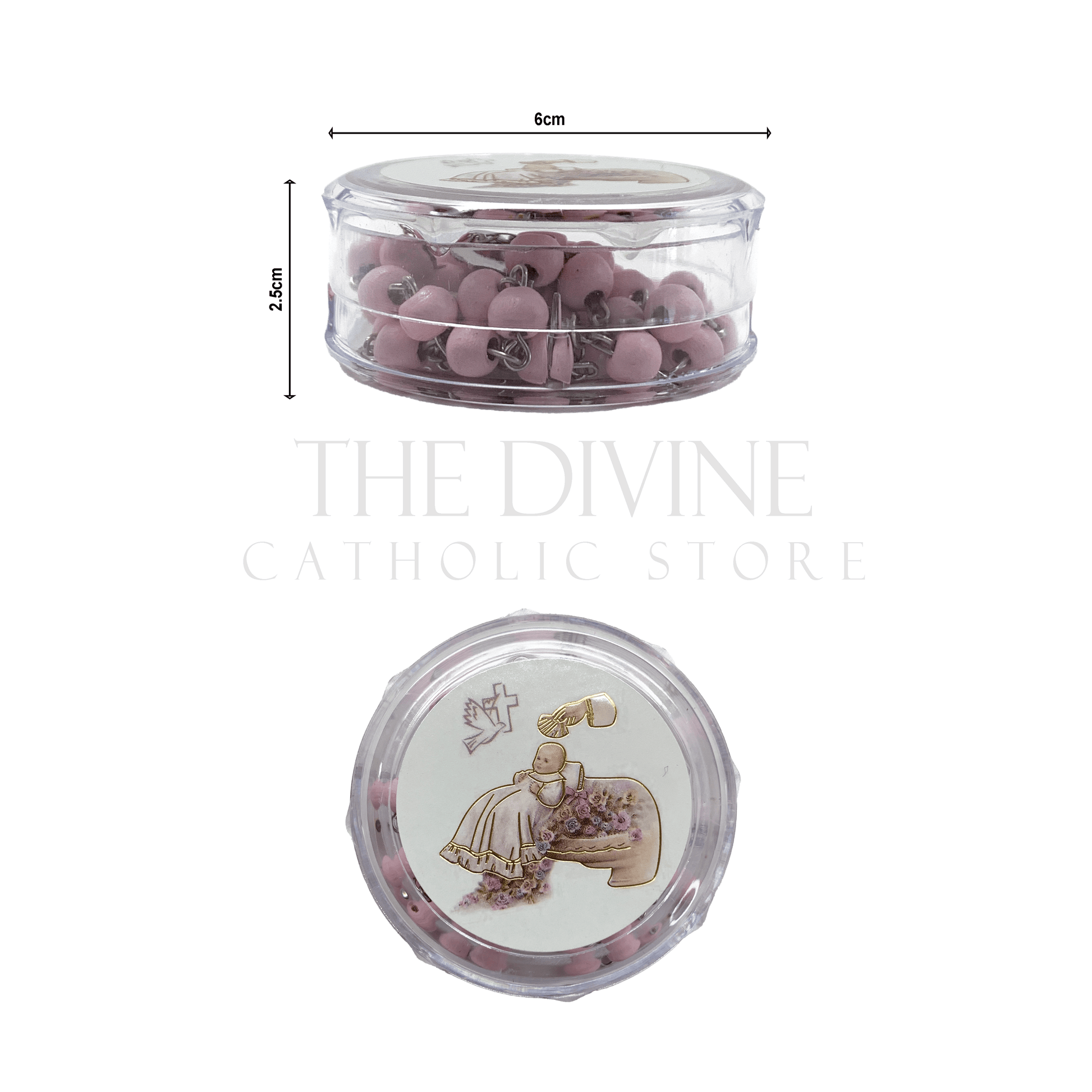 Pink baby girl baptism rosary with crucifix in round clear case featuring a baptism-themed illustration on the lid and showing dimensions of round container, 6cm x2.5 cm on white background.