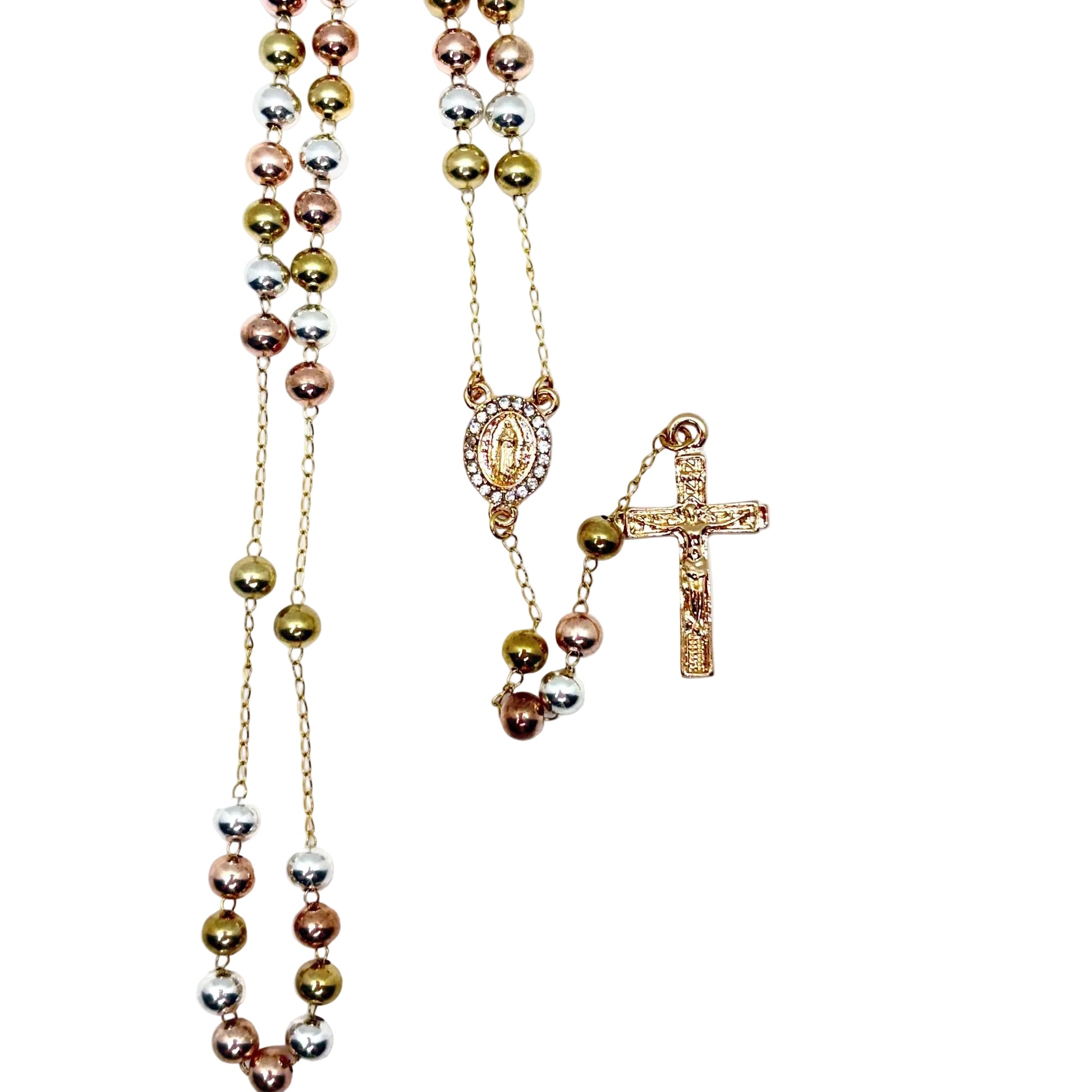 Tri-color stainless steel rosary with smooth round beads and Our Lady of Guadalupe cubic zirconia pendant flat lay view
